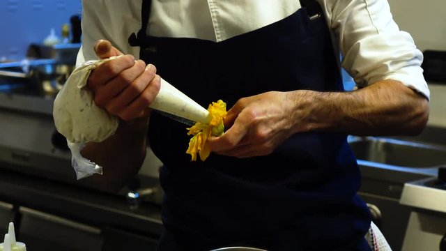 preparing squash flower stuffing  
