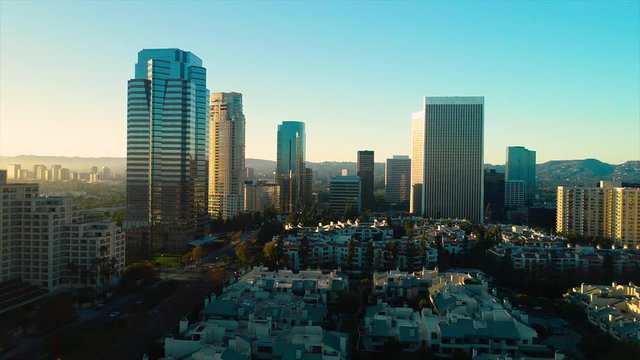 Studio City Los Angeles CA December 2018 sunset 5PM near skyline aerial view with Beverly Hills and the Santa Monica Mountains in background from helicopter drone plane