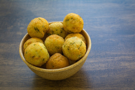 bolinhos de bacalhau - codfish in Portuguese - delicious salty Brazilian cuisine on the table
