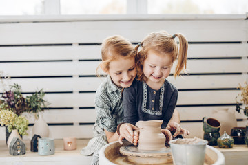 positive kids creating a jar indoors. close up photo. development of the children. early child development. favourite pastime