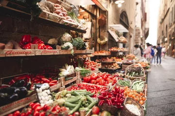 Foto op Canvas Beautiful fresh vegetables are sold in the street market on the narrow streets of the European town. Fresh vegetables are sold on the streets of Florence, Italy © bodnarphoto