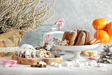 Christmas dessert table with traditional cakes and sweets