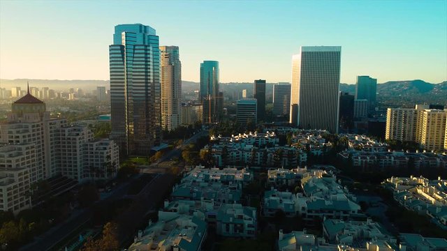 Studio City Los Angeles CA December 2018 sunset 5PM near skyline aerial view with Beverly Hills and the Santa Monica Mountains in background from helicopter drone plane