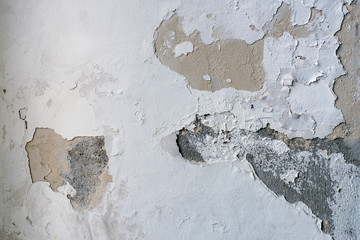 Old concrete wall with rust and cracks