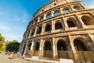 Fototapeta premium World famous Coliseum under a blue sky