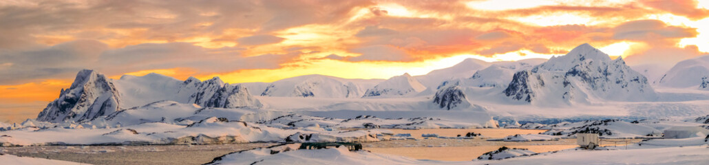 Ice-covered ridges at twilight at the base of Antarctic Peninsula. Shot from the Galindez Island,...