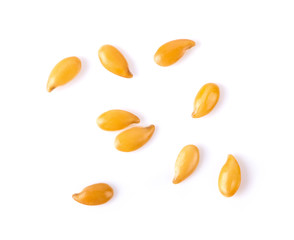 flax seeds isolated on white background. top view
