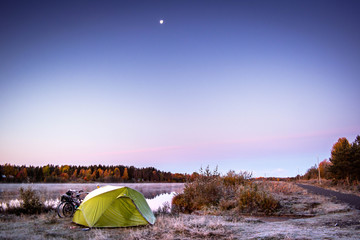 Wild camping on clear winter night in Finland