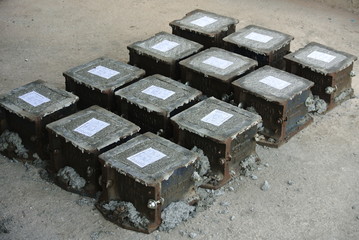Cube test. Steel mold in square shape used to get standard square shape concrete block. The concrete block will be used for compression test in laboratory. 