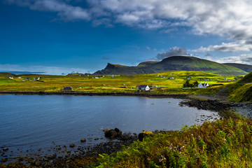 Scenic Village In Rural Landscape At The Coast Of The Isle Of Skye In Scotland