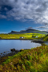 Scenic Village In Rural Landscape At The Coast Of The Isle Of Skye In Scotland
