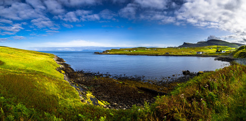 Scenic Village In Rural Landscape At The Coast Of The Isle Of Skye In Scotland