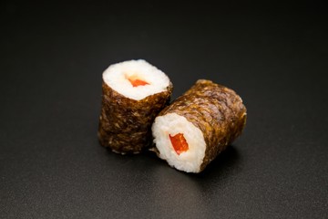 sushi on black background