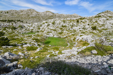 Biokovo  is the second-highest mountain range in Croatia, lalong the Dalmatian coast of the Adriatic Sea.
