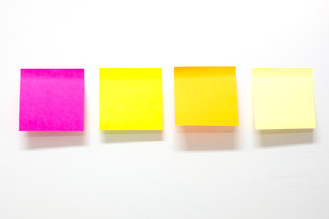 blank stick note paper or post it on white background. reminder and business concept