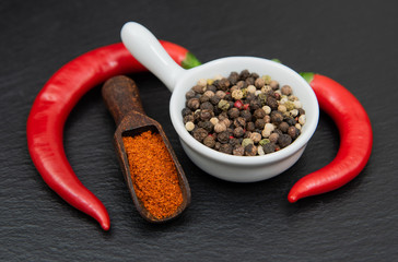 Hot spicy mix. Red chili pepper with mixed peppercorns and chili powder