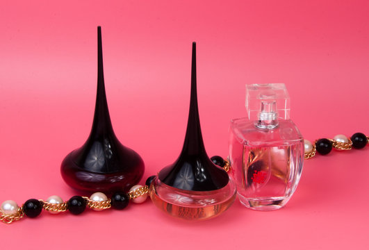 parfume bottle spray elegance on pink background