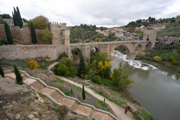 Fototapeta premium The Puente de San Martin (St Martin's Bridge), a medieval bridge across the river Tagus in Toledo, Spain. Constructed in the late 14th century. 