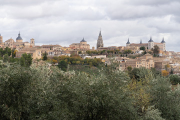 Fototapeta na wymiar Skyline of old city of Toledo, Castile-La Mancha, Spain. View from the Ermita del Valle (Hermitage of Virgen del Valle) on the opposite bank of the river Tagus.
