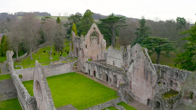 Aerial view to ruins of Dryburgh Abbey on the banks of the River Tweed in the Scottish Borders, was nominally founded on 10 November 1150, Scotland
