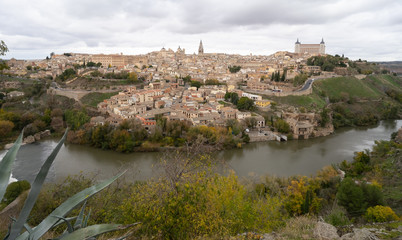 Skyline of old city of Toledo, Castile-La Mancha, Spain. View from the Ermita del Valle (Hermitage of Virgen del Valle) on the opposite bank of the river Tagus.