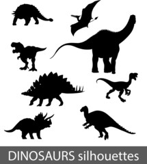 Dinosaurs silhouettes vector set. © Alena_A