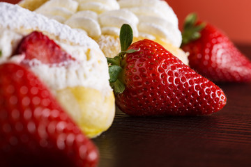Sweet sandwich with cream and strawberries
