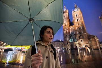 Woman with umbrella in Krakow
