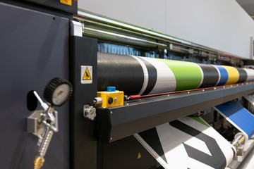Professional  printing facility, big vinyl rolls, ready for large printer supply. Glossy, matte, ecological materials, mostly used for commercial billboards, urban advertising, and oversized projects.