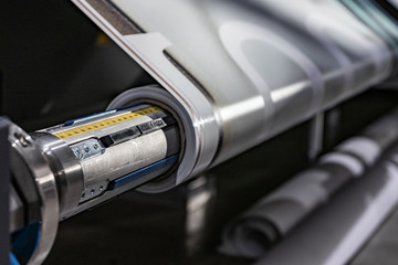 Massive machinery. Professional  printing facility, big vinyl rolls, ready for plotting. Glossy,...