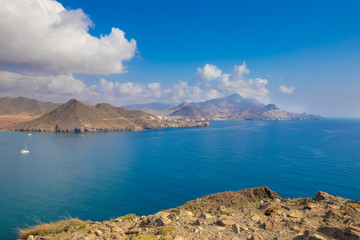 awesome coastline of San Jose village from top of mountain in Gata Cape Natural Park (Cabo de Gata in Spanish), wild and beautiful famous destination, in Almeria (Andalusia, Spain, Europe)