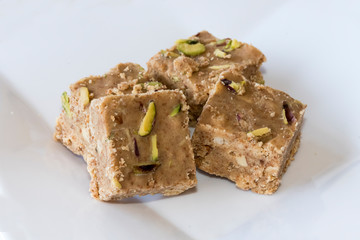Adadiya (sweetened black gram flour fudges made with cardamom, ginger, nutmeg,almonds and saffron ) – Indian Sweet made in the winters