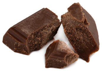 Broken chocolate pieces isolated on white background