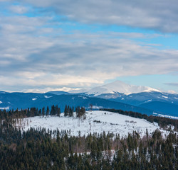 Evening winter cloudy day mountain ridge