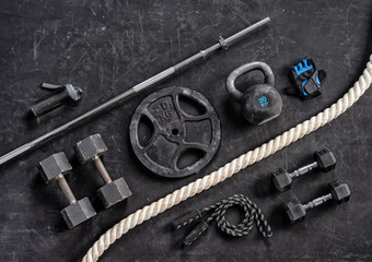 Sports equipment on a black background. Top view. Motivation