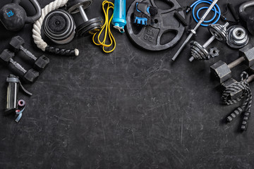 Sports equipment on a black background. Top view. Motivation