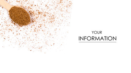 Pile coriander seasoning ground on a white background wooden spoon pattern, with top view