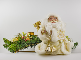 Santa Claus with bells and christmas decoration