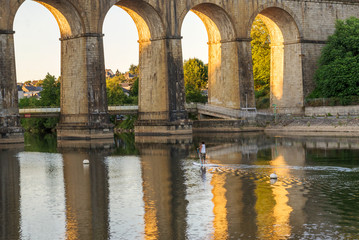 Fototapeta premium Bridge.Banks of the Mayenne river, City of Laval, Mayenne, Pays de Loire, France. August 5, 2018