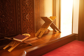 Quran - holy book of Muslims, scene in a mosque