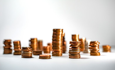 stacks of coins on white background