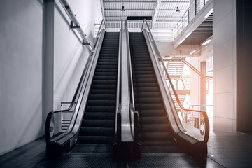 Mechanical escalator in the international airport or modern subway train station