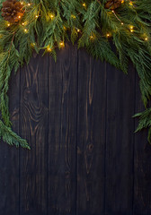 Christmas wood, cypress and golden lights background