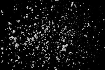 Crumbled styrofoam isolated on black background, top view, clipping path