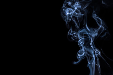 Smoke cigarettes on black background