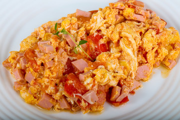Scramble with sausages