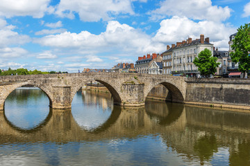 Obraz premium Bridge.Banks of the Mayenne river, City of Laval, Mayenne, Pays de Loire, France. August 5, 2018