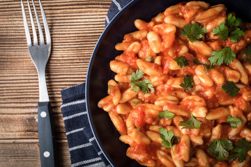 Cavatelli pasta with fresh tomato sauce.