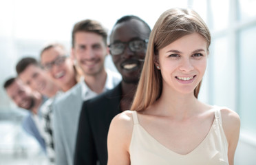 Business people standing in row on the office background