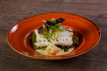 Steamed fith with salad